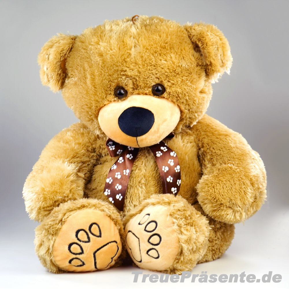 Plüschbär sitzend